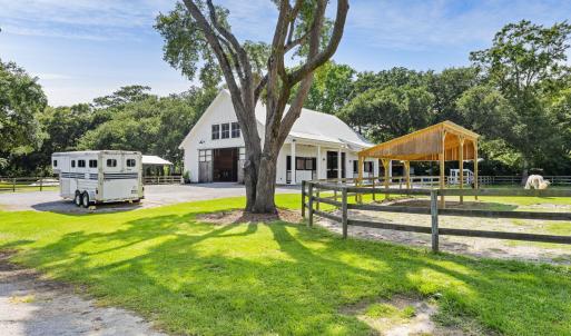 Barn, arena, and paddock