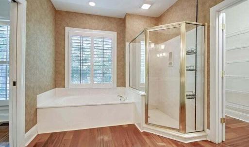 Large soaking tub and walk-in closet
