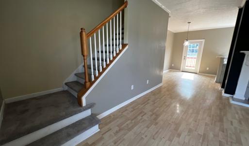 Staircase leading to the remodeled upstairs in 202