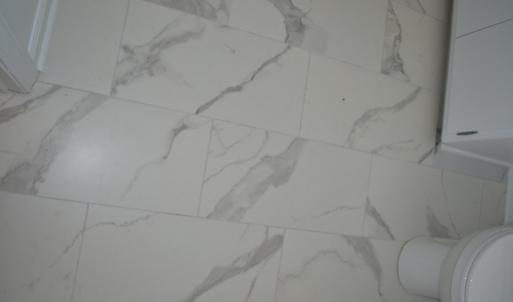 New Ceramic flooring in Kitchen and bath areas
