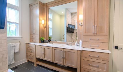 Primary suite vanity with abundant storage