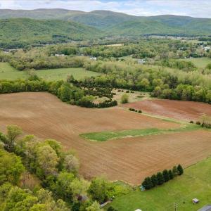 51 acres fronting on Naked Creek, protected in a conservation easement allowing for one residence and a agri barn. Take a look