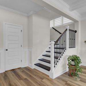 29. Staircase with open rails and decor