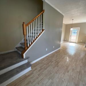 Staircase leading to the remodeled upstairs in 202