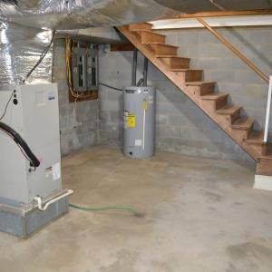 Partial basement for easy access to central vac